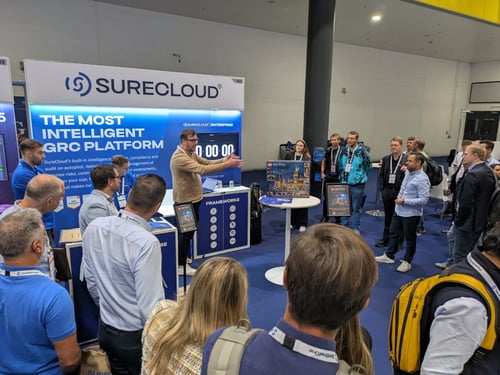 Attendees visiting the SureCloud booth at the Gartner Security & Risk Management Summit 2025